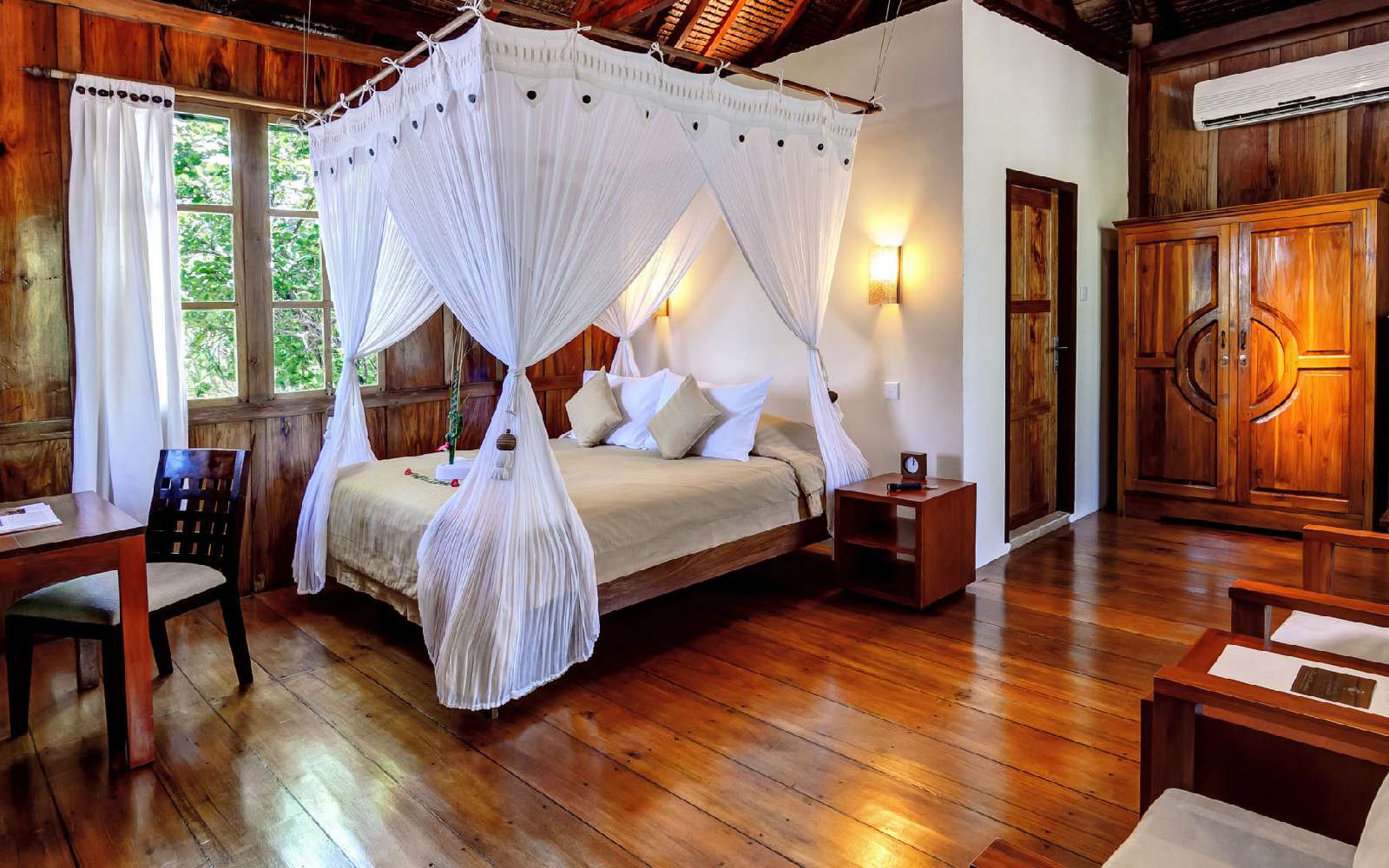 Wakatobi Dive Resort wakatobi-palm-bungalow-bedroom.jpg